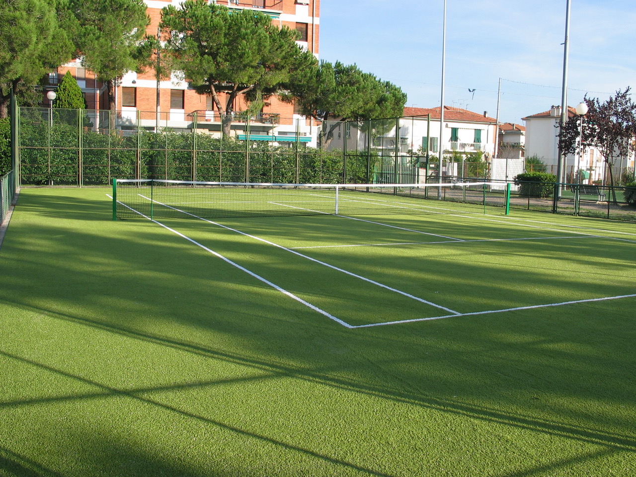 Campo in erba sibntetica per tennis Playsport